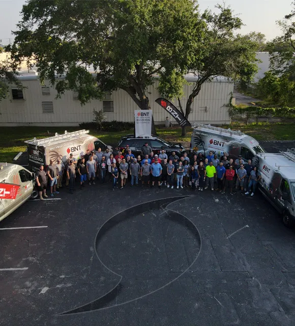 BNT Impact Windows & Doors installation team at work